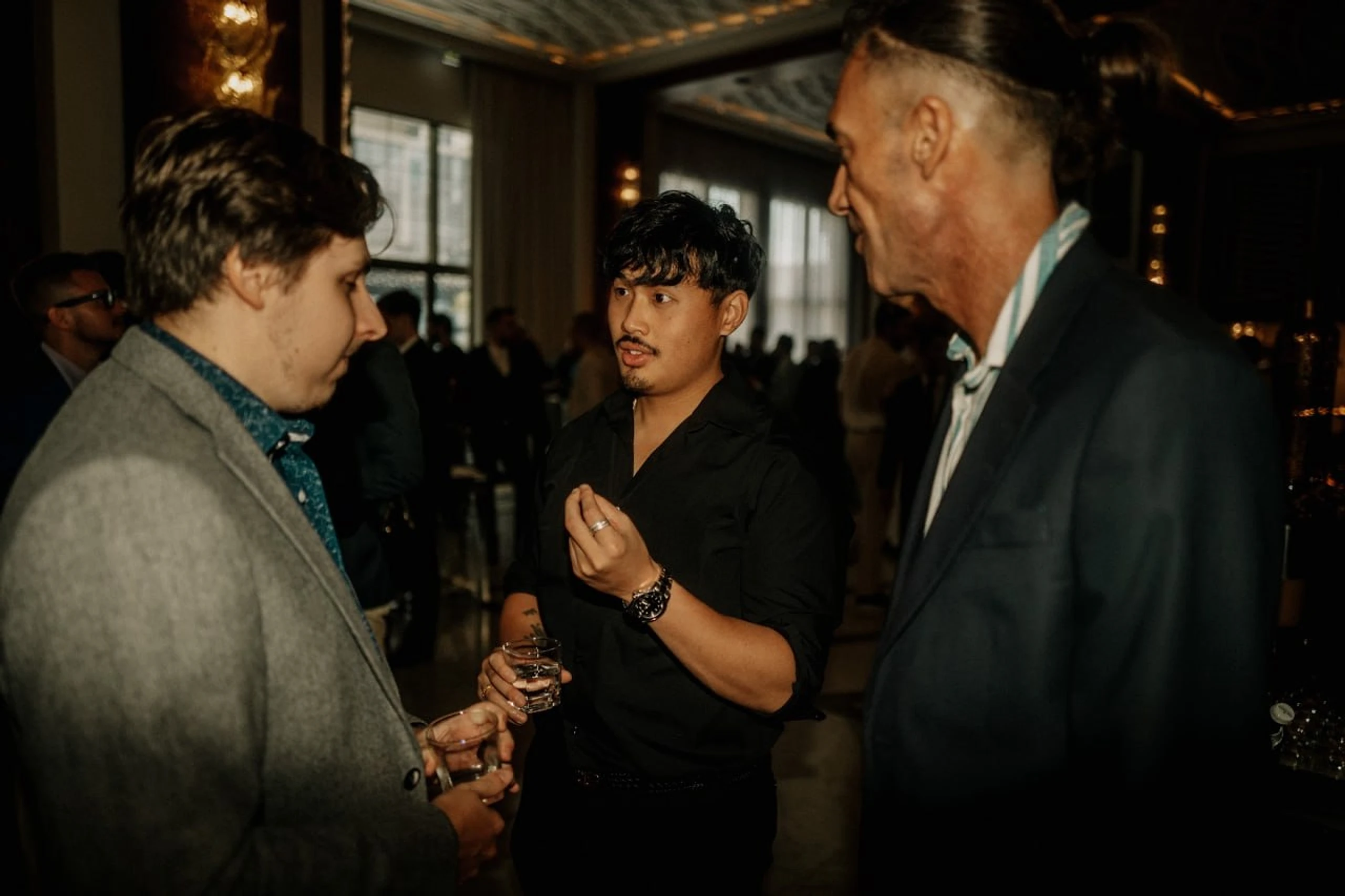 Allan Chan networking with business owners at an event